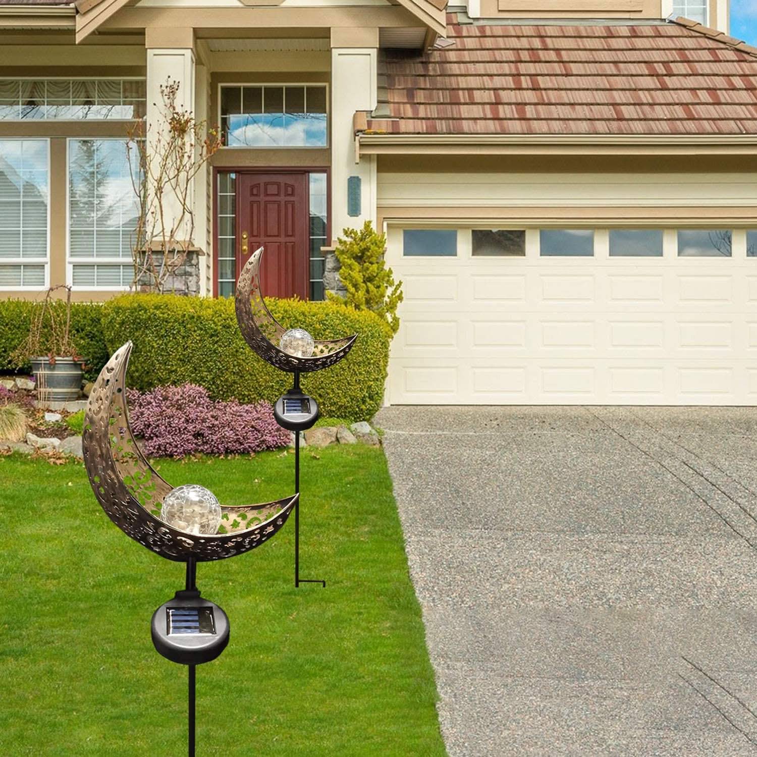 Solar-powered decorative lights in front of a house