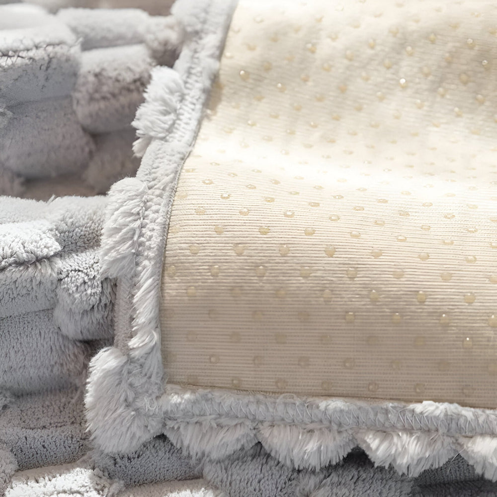 Close-up of textured pillows with a focus on color and pattern.