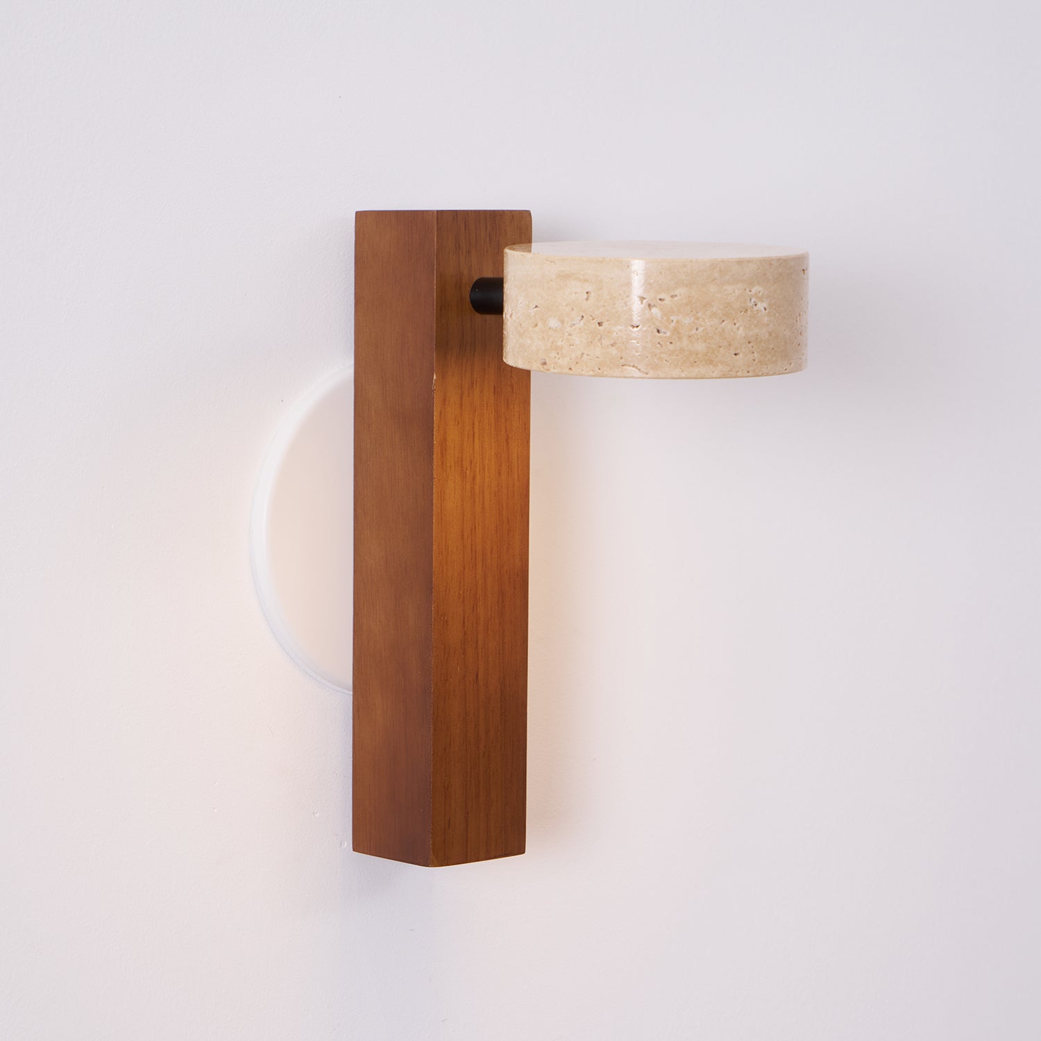 Wall-mounted light fixture with wooden bracket and beige lampshade on a white background