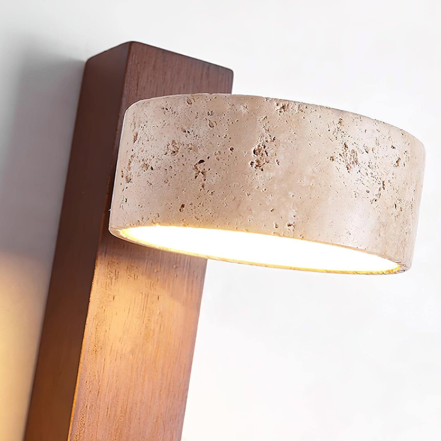 Wall-mounted lamp with wooden base and textured beige shade on a white background