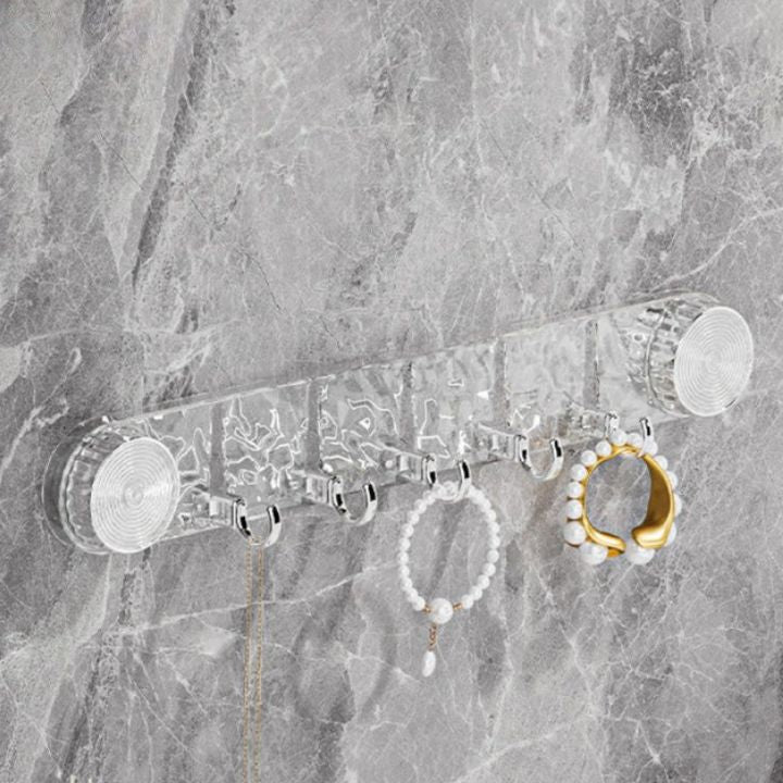 Jewelry organizer with earrings and rings on a marble surface