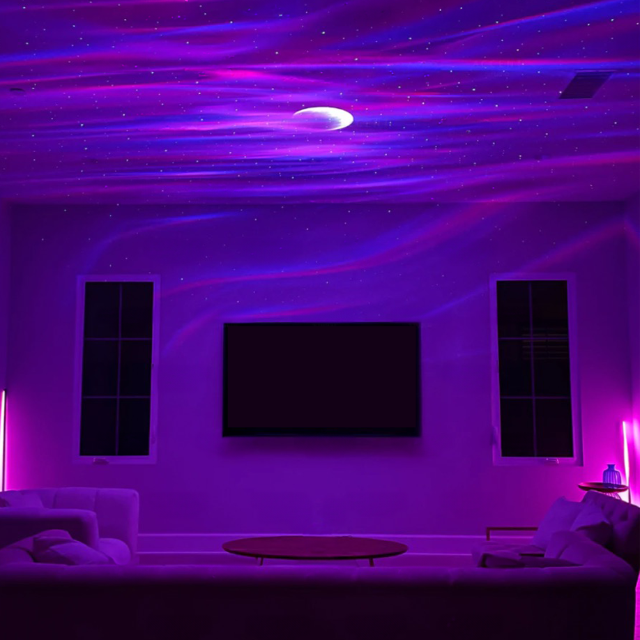 Modern living room with a large TV screen and decorative lighting in a purple hue.