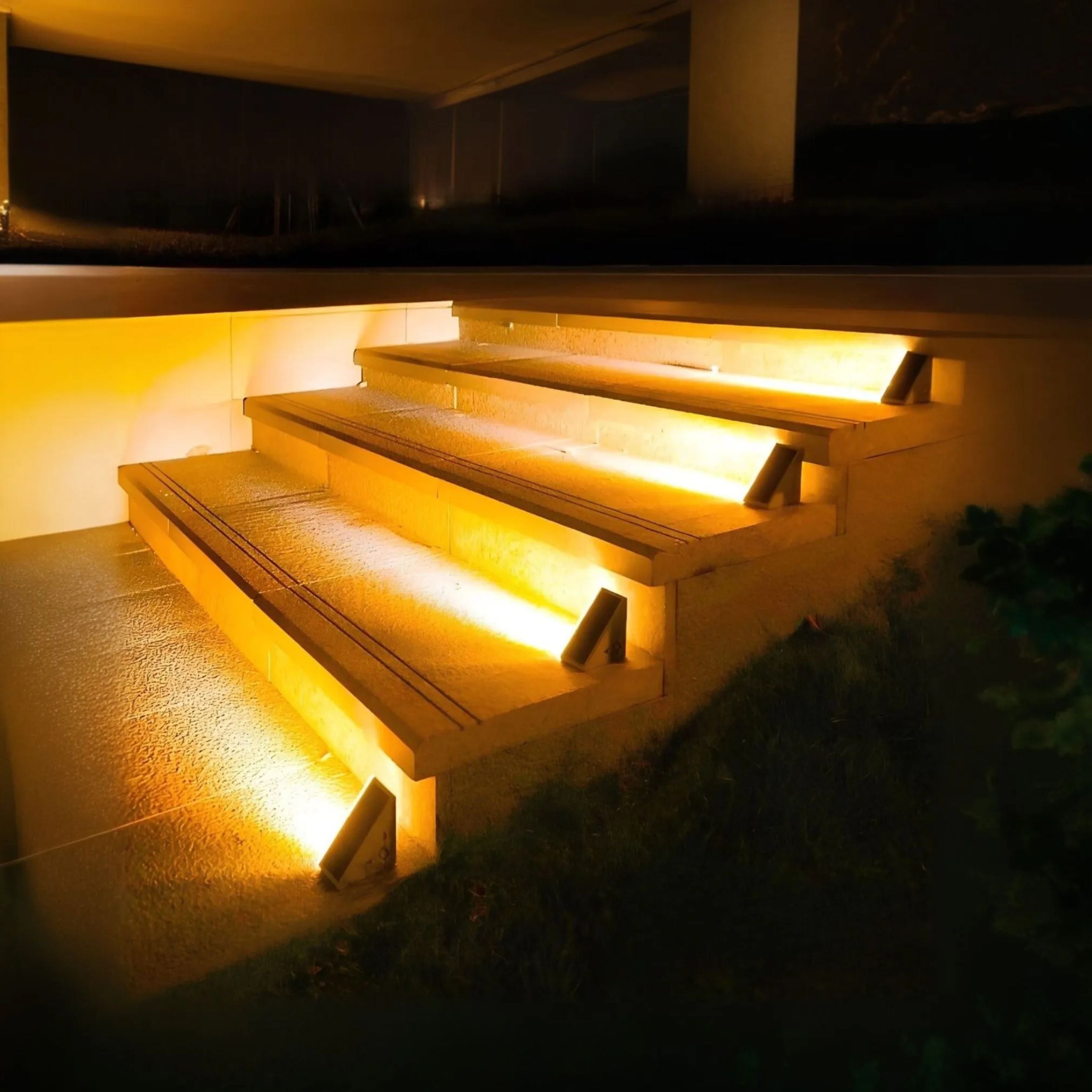 Stairs with embedded lighting in a dark outdoor setting