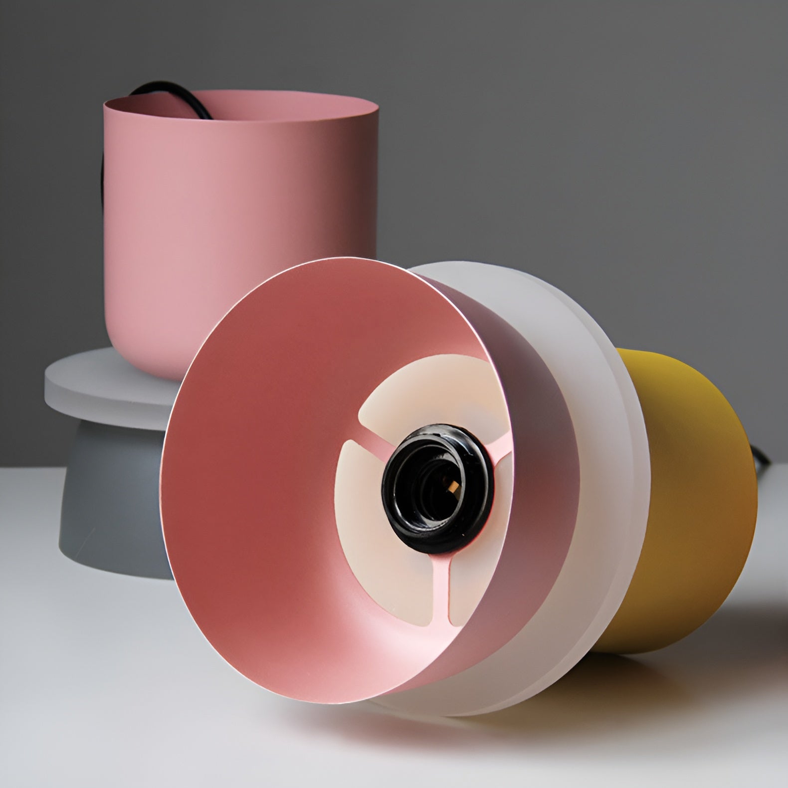 Colorful lampshades on a gray background