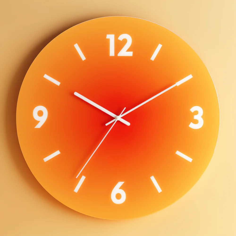 Orange wall clock with white numbers on a beige background
