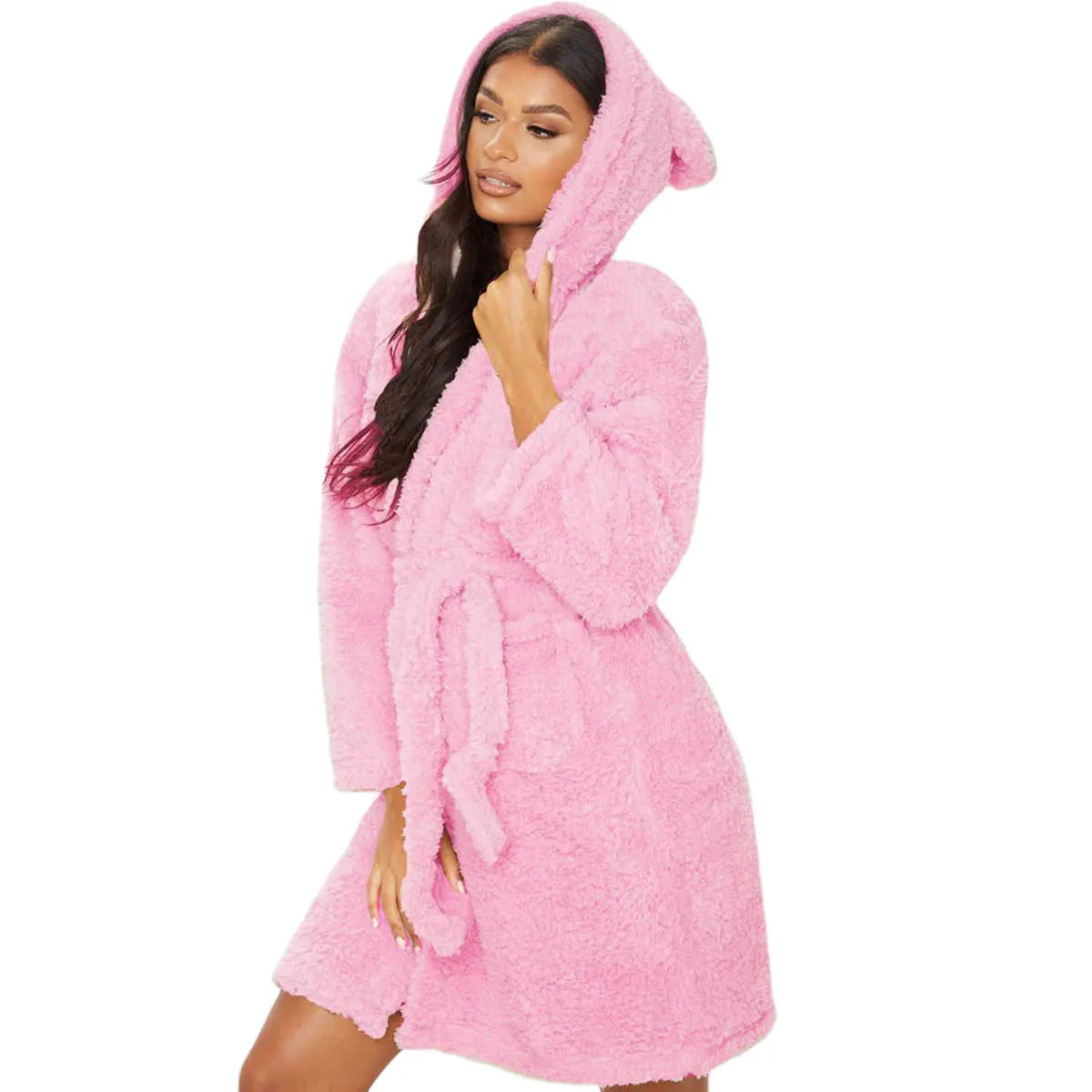 Woman wearing a pink plush robe on a white background