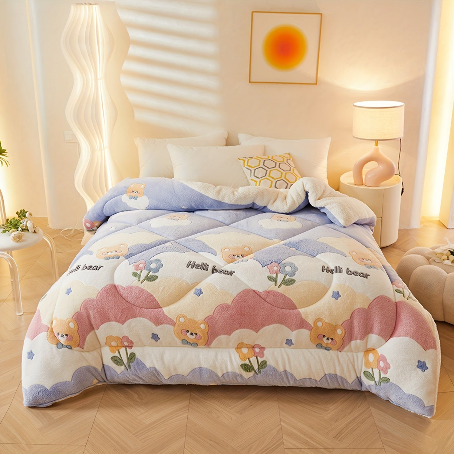 Children's bedroom with a colorful teddy bear-themed comforter on a bed.