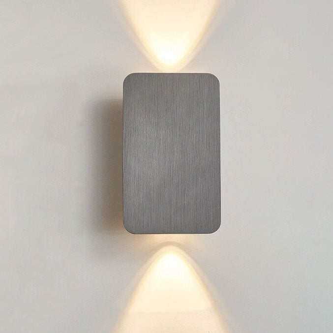 Square wall light fixture on a plain wall
