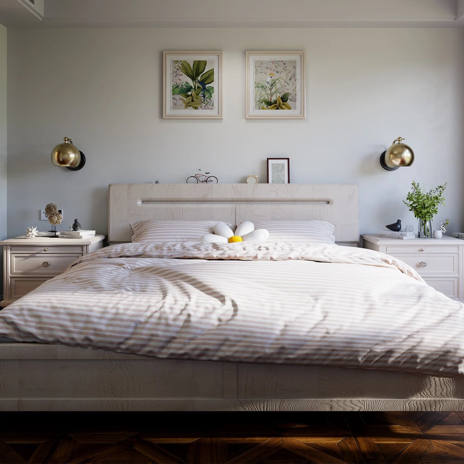 Neatly made bed in a bedroom with decorative elements and wall art.