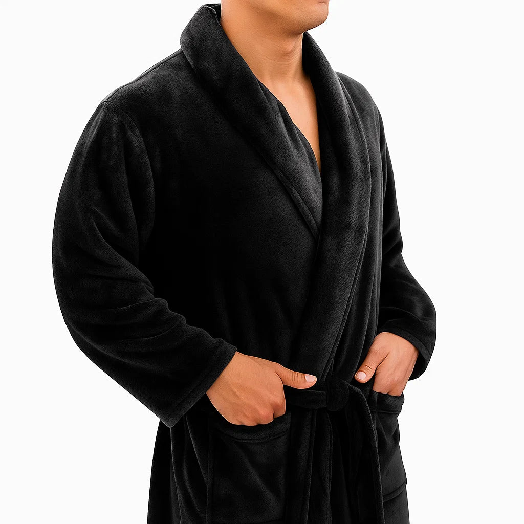 Black robe worn by a person on a white background