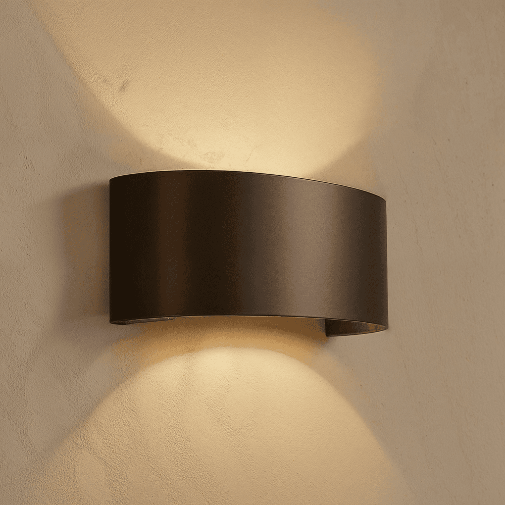 Black wall-mounted light fixture on a beige wall
