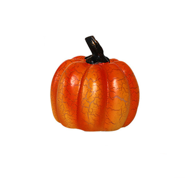 Small orange pumpkin with dimensions labeled on a white background