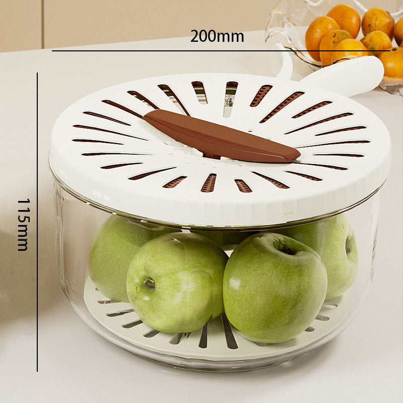 Fruit storage container with apples and a chocolate bar, labeled dimensions.