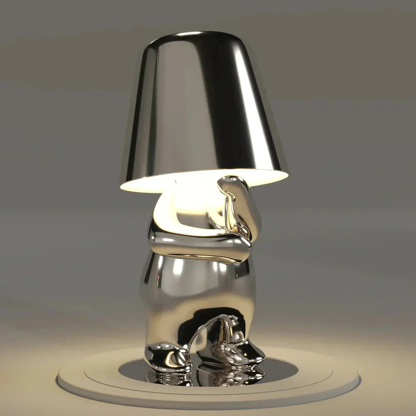 Metallic lamp with a unique design on a gray background