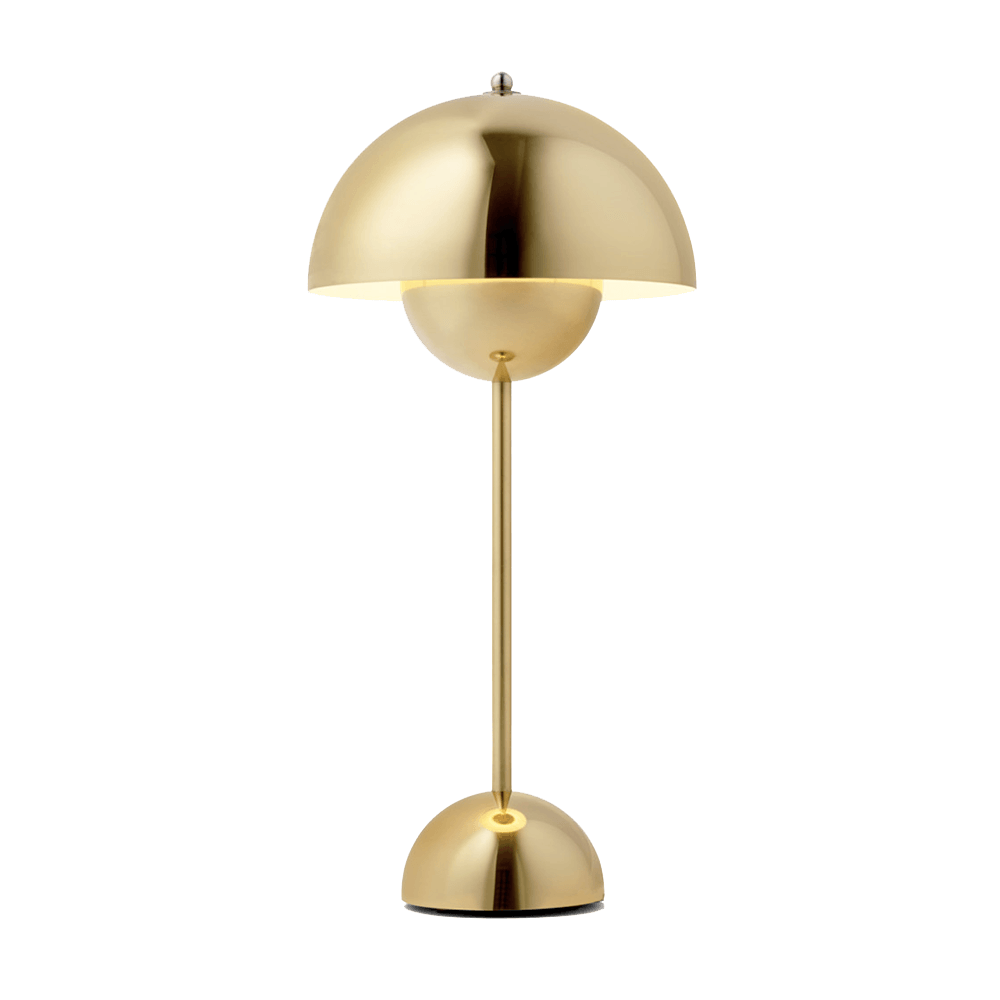 Gold table lamp on a white background