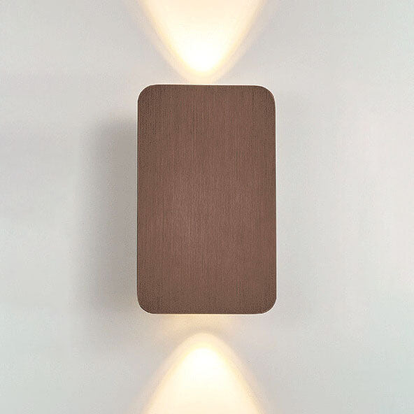 Square wall light fixture on a plain wall