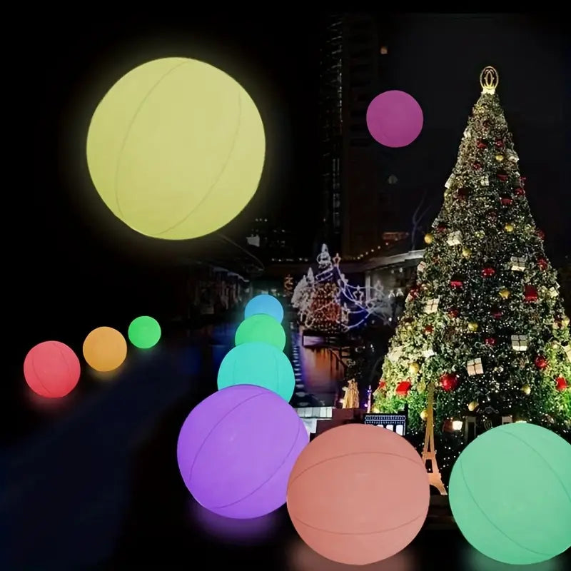 Colorful glowing balls with a Christmas tree and festive decorations in the background.