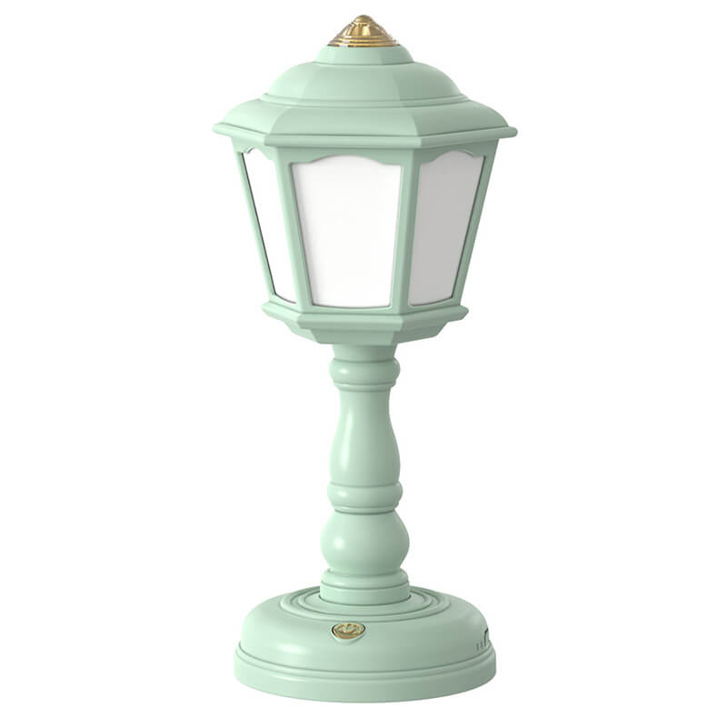 Mint green outdoor lamp post on a white background