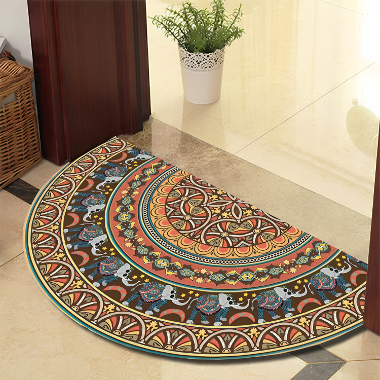 Decorative half-circle rug with elephant design on a tiled floor.
