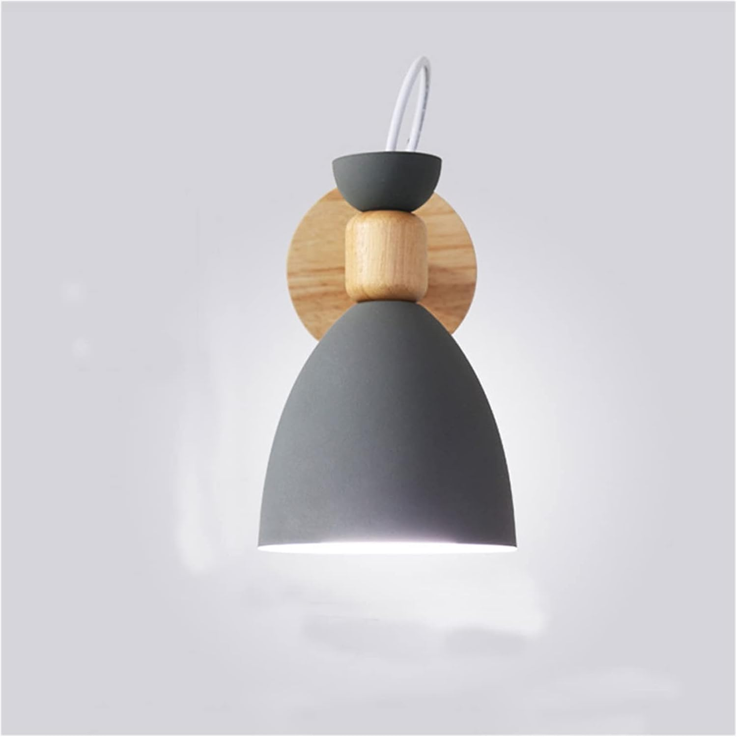 Modern wall light fixture with gray shade and wooden accents on a white background