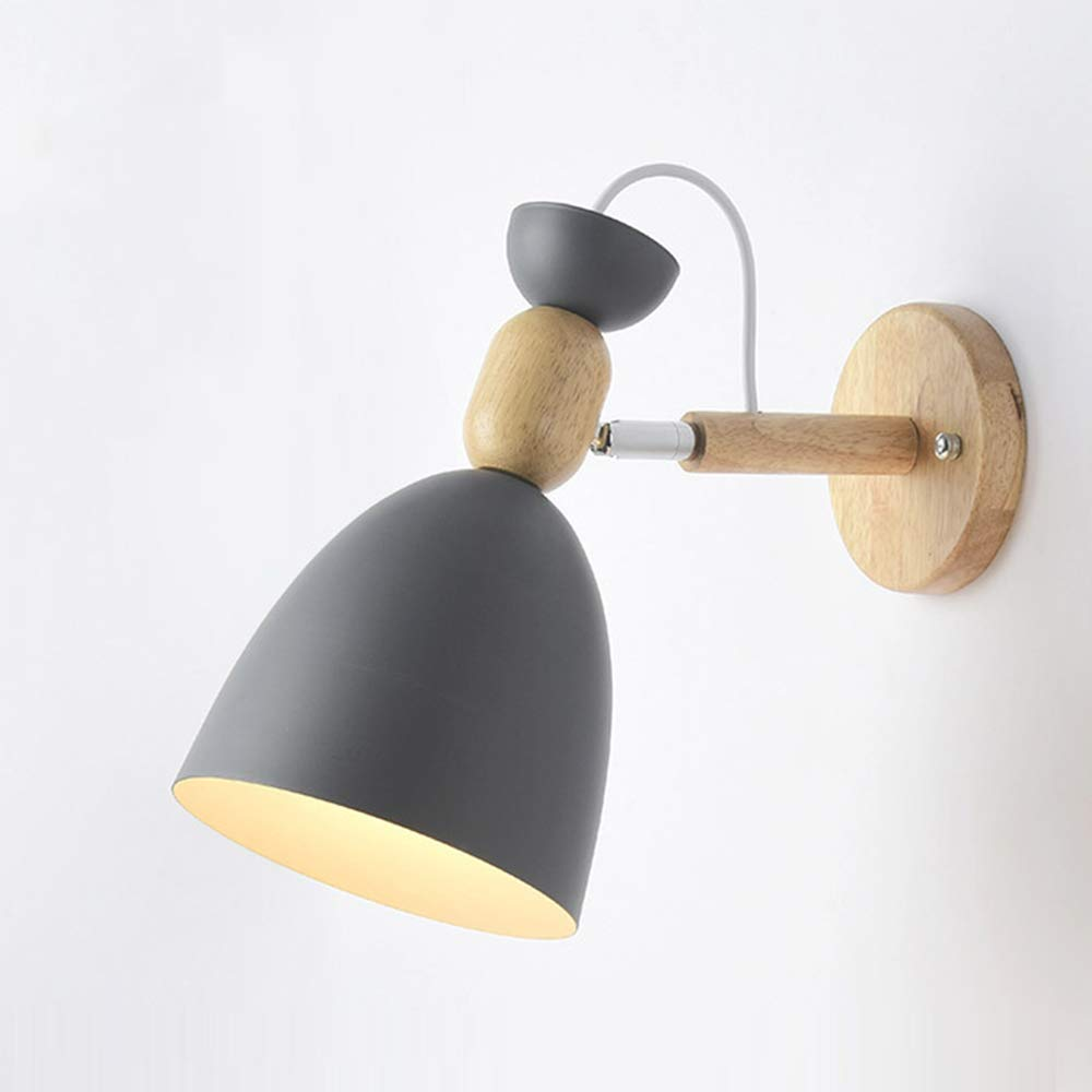 Wall-mounted lamp with gray shade and wooden arm on a white background