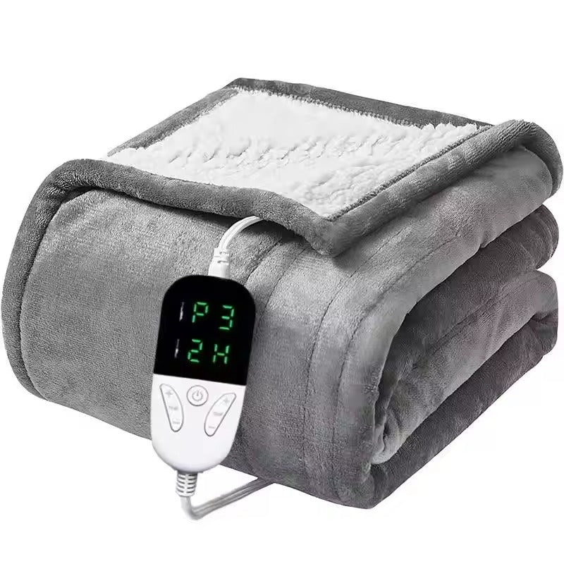 Gray electric blanket with digital controller on a white background