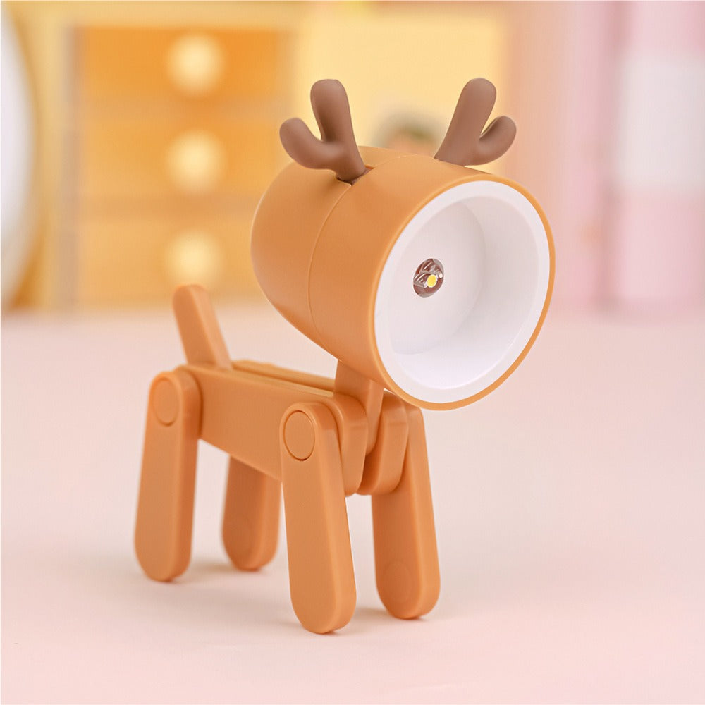 Deer-shaped night light on a soft pink background