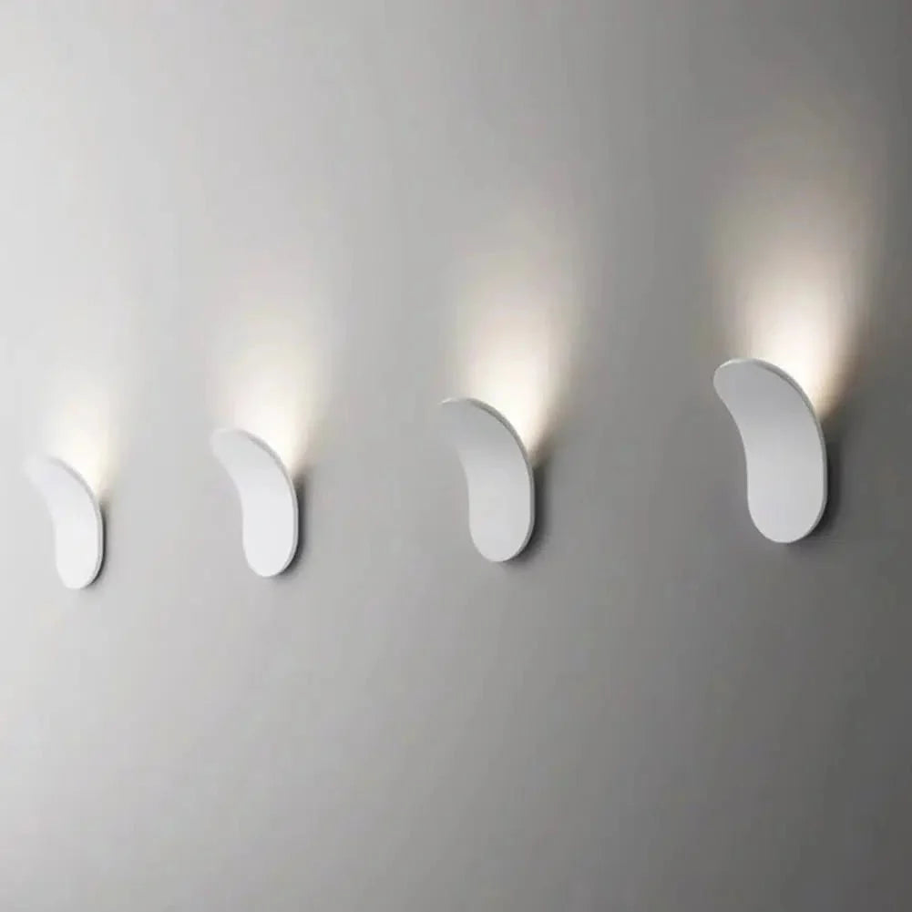 Modern wall lights on a gray wall