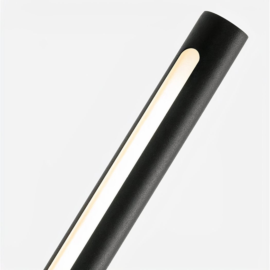Modern black cylindrical light fixture on a white background