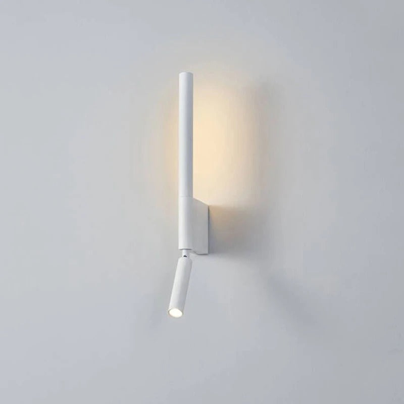 Modern wall-mounted light fixture on a plain wall