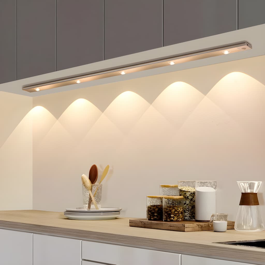Under-cabinet lighting fixture in a kitchen setting