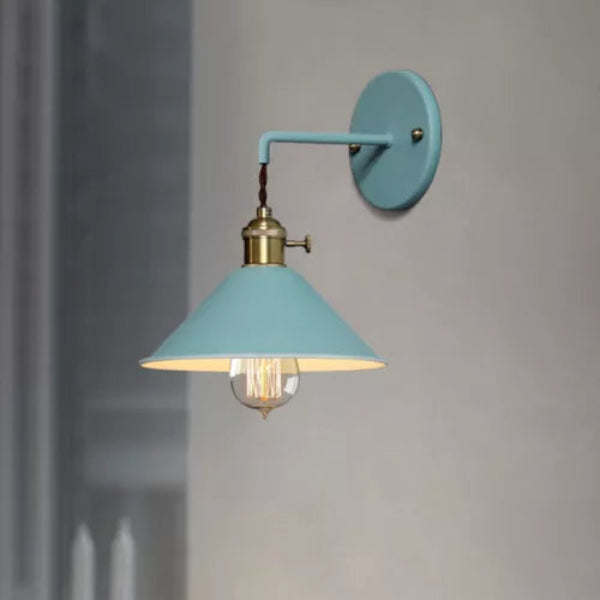 Blue wall lamp with a light bulb on a gray background