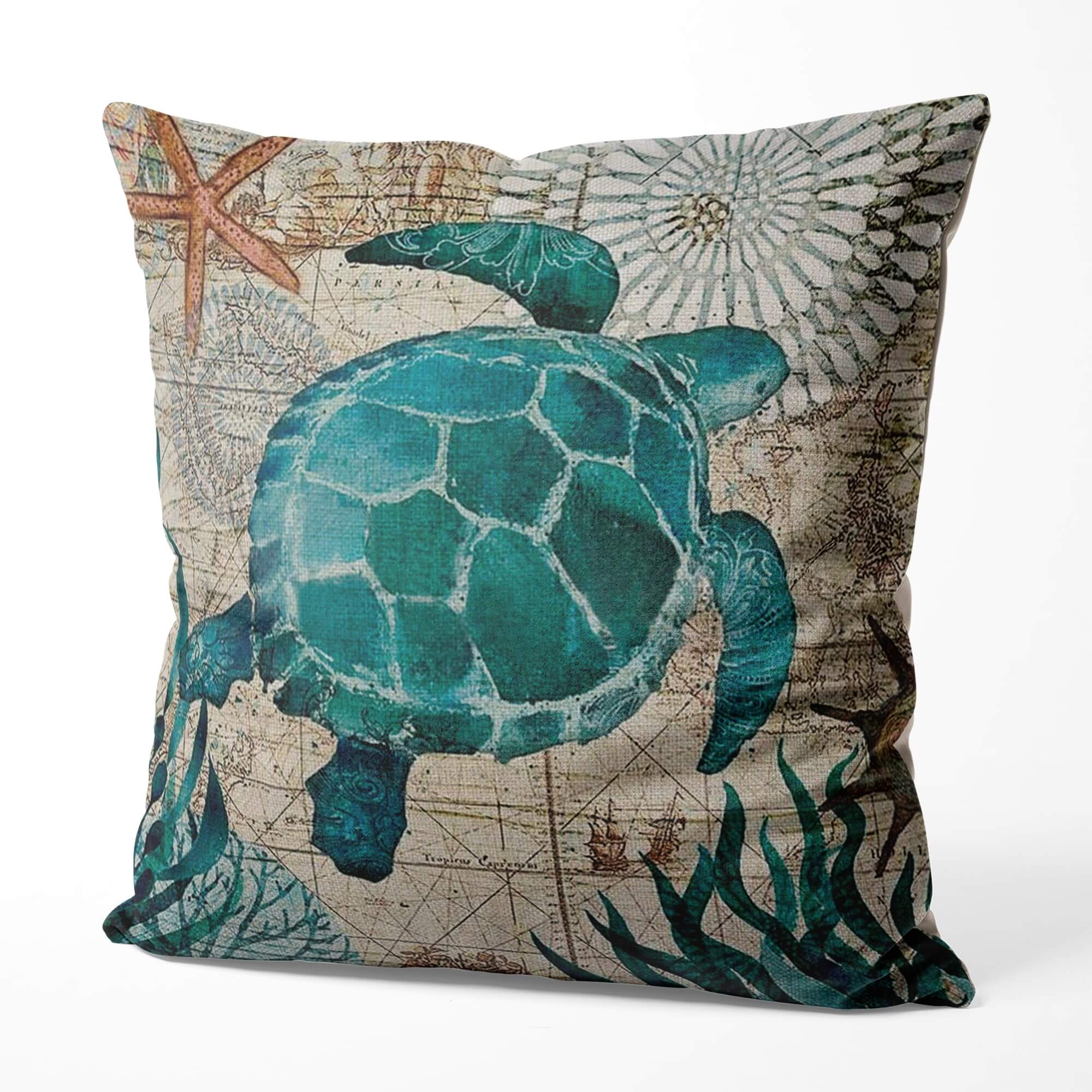 Decorative pillow with a turtle design on a map background