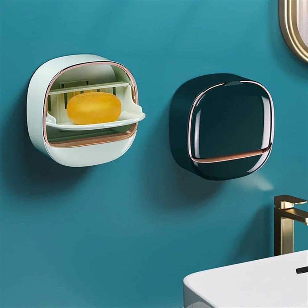 Wall-mounted soap dispenser with a bar of soap on a teal wall.