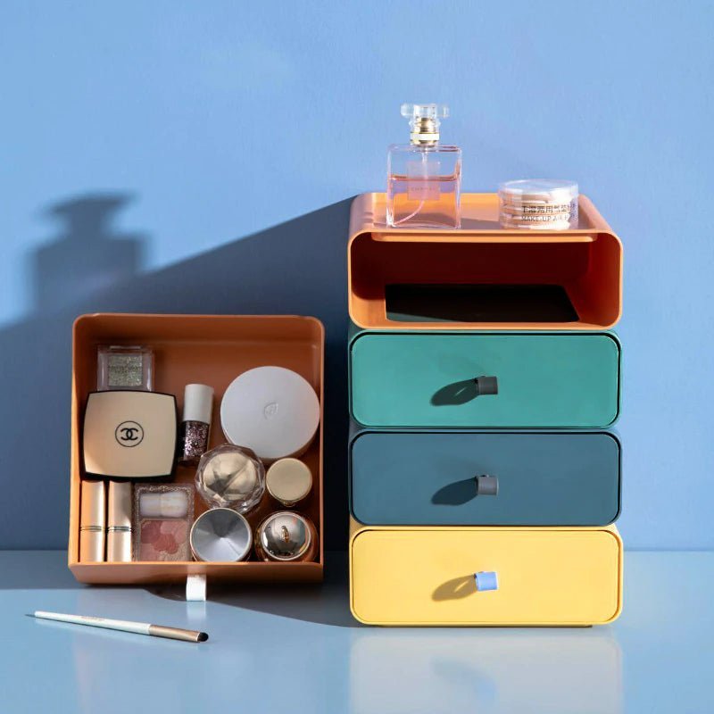 Colorful cylindrical storage drawers with cosmetic items on a blue background