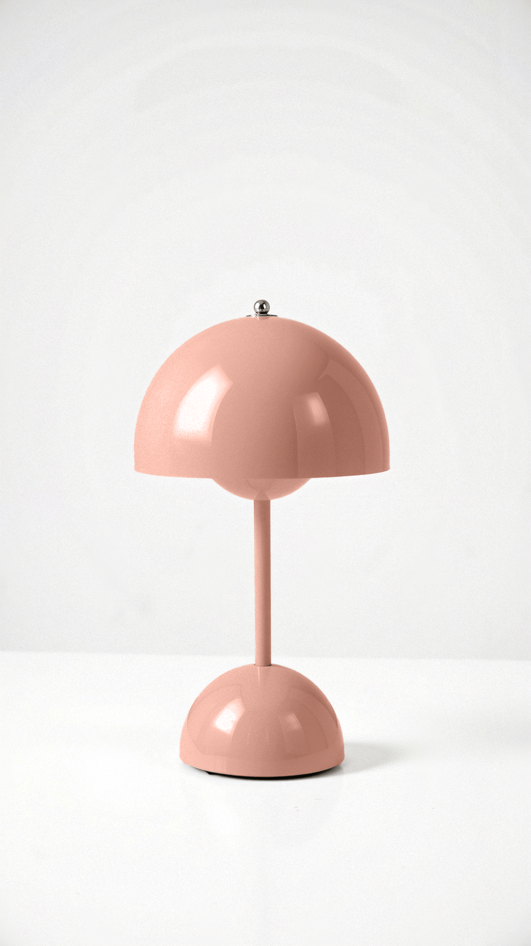 Pink table lamp on a white background