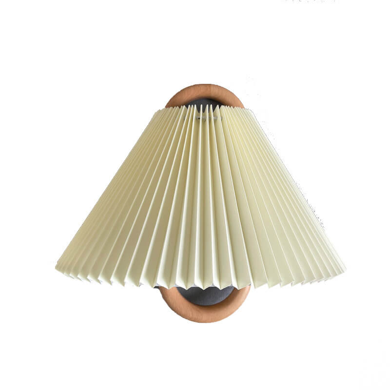 Lamp with pleated beige shade on a white background