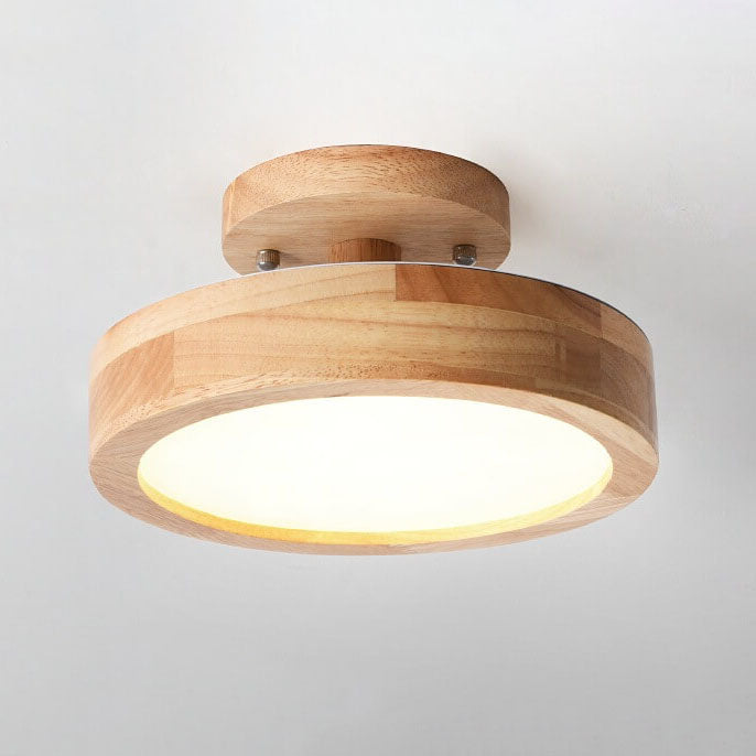Wooden ceiling light fixture on a plain background