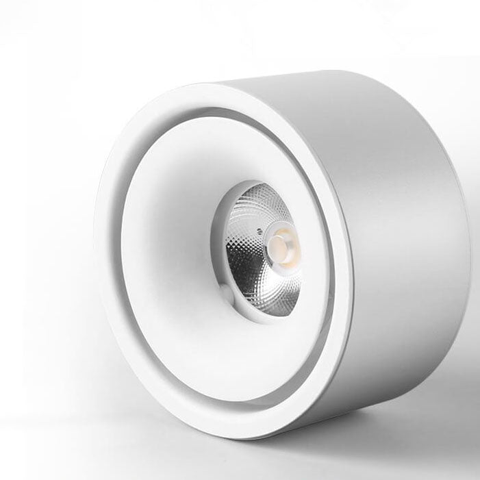 White cylindrical light fixture on a white background