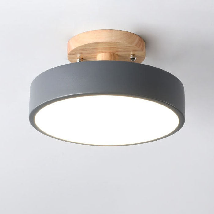 Ceiling light fixture with gray shade and wooden finish on a white background
