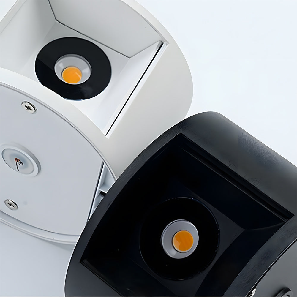 Close-up of a white and black electronic device with circular components.