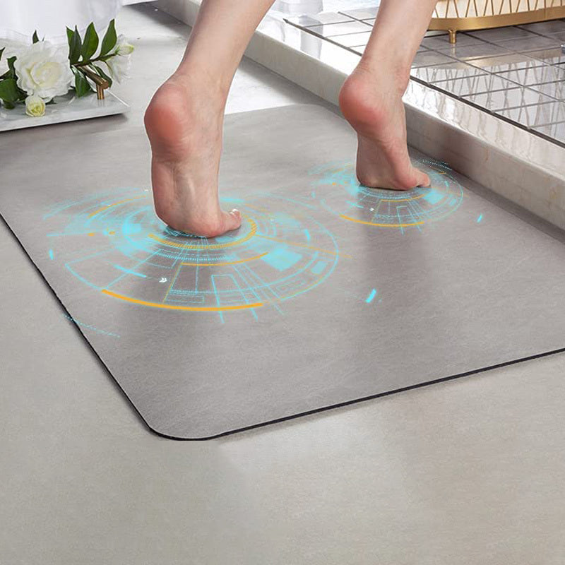 Person stepping onto a futuristic looking mat with digital design on a modern floor.