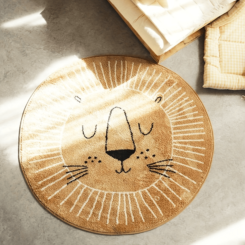 Round beige rug with a lion face design on a concrete floor.