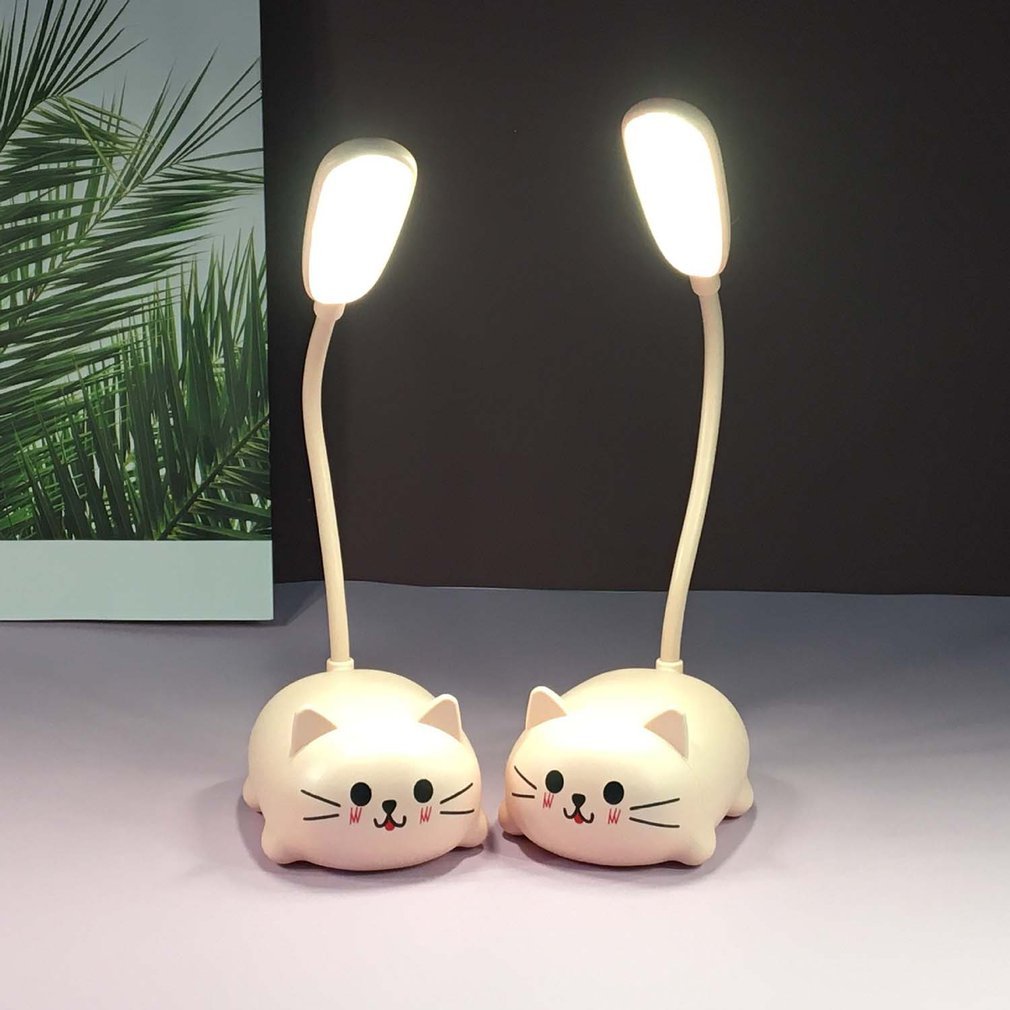 Two cat-shaped desk lamps with long flexible necks on a neutral background.