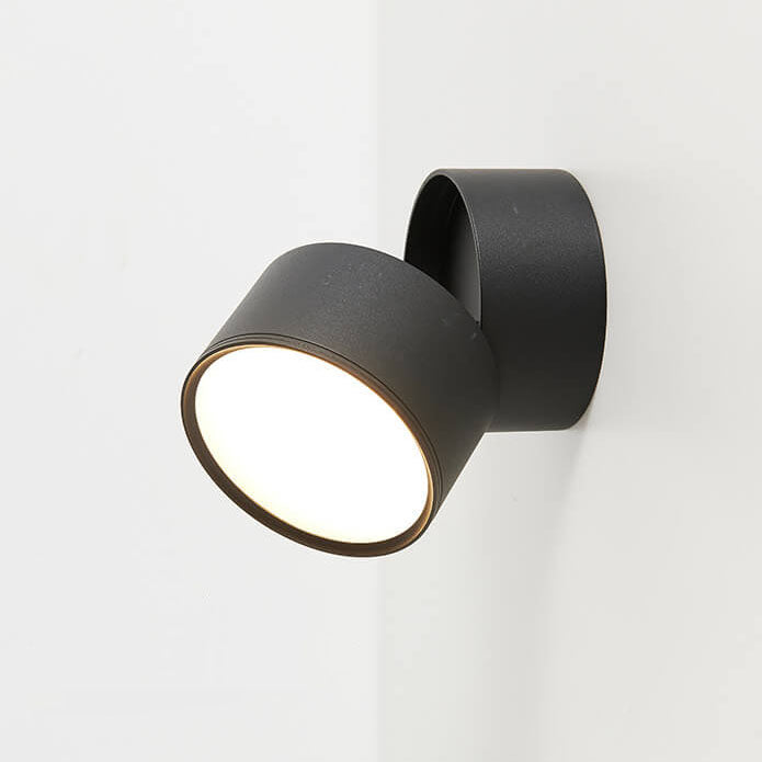 Black wall-mounted light fixture on a white background