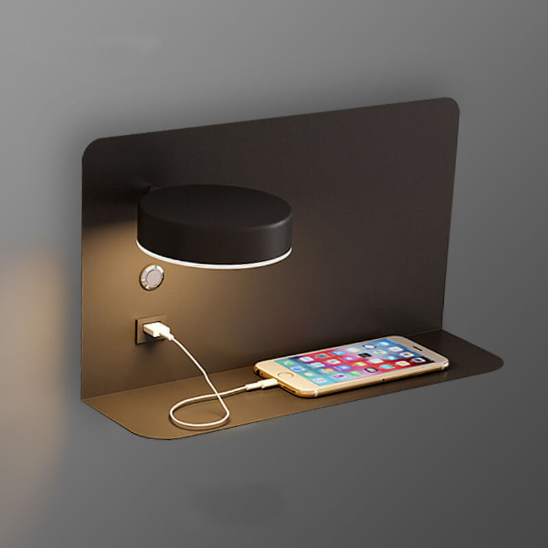 Wall-mounted light fixture with a smartphone on a shelf against a gray background