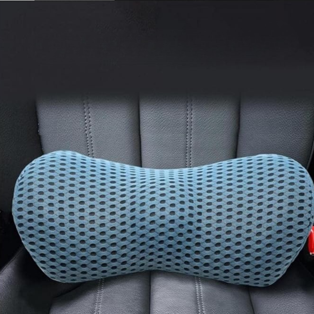Blue neck pillow on a car seat with a dark background