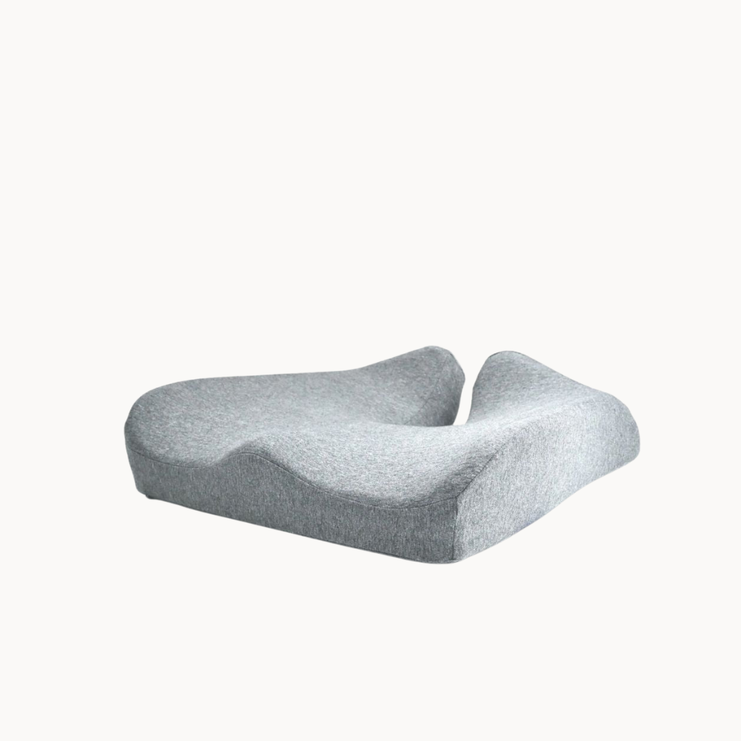 Gray foam pillow on a white background