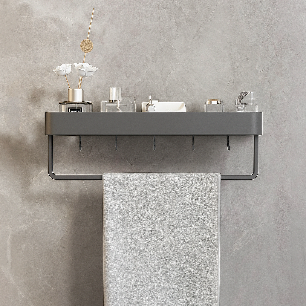 Gray towel rack with decorative items on a textured wall