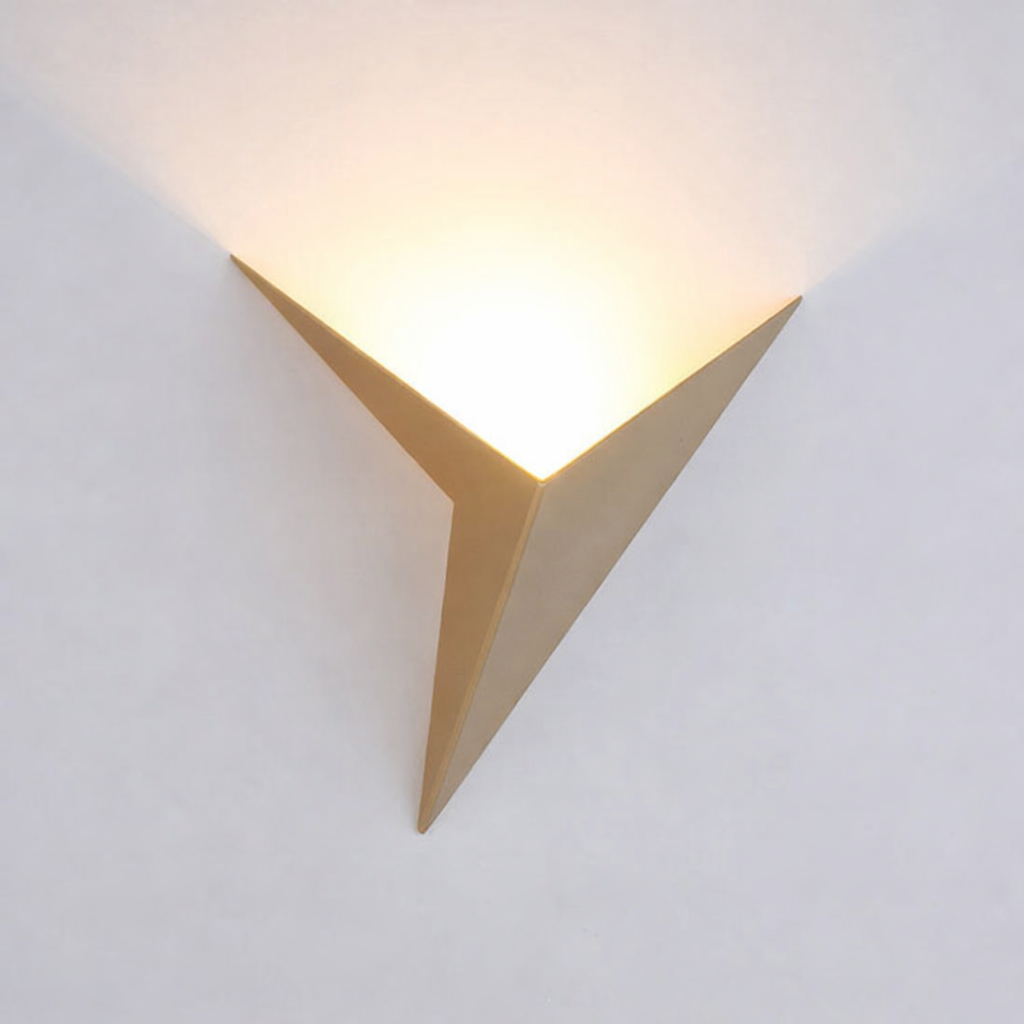 Modern wall light fixture with a triangular design on a white background